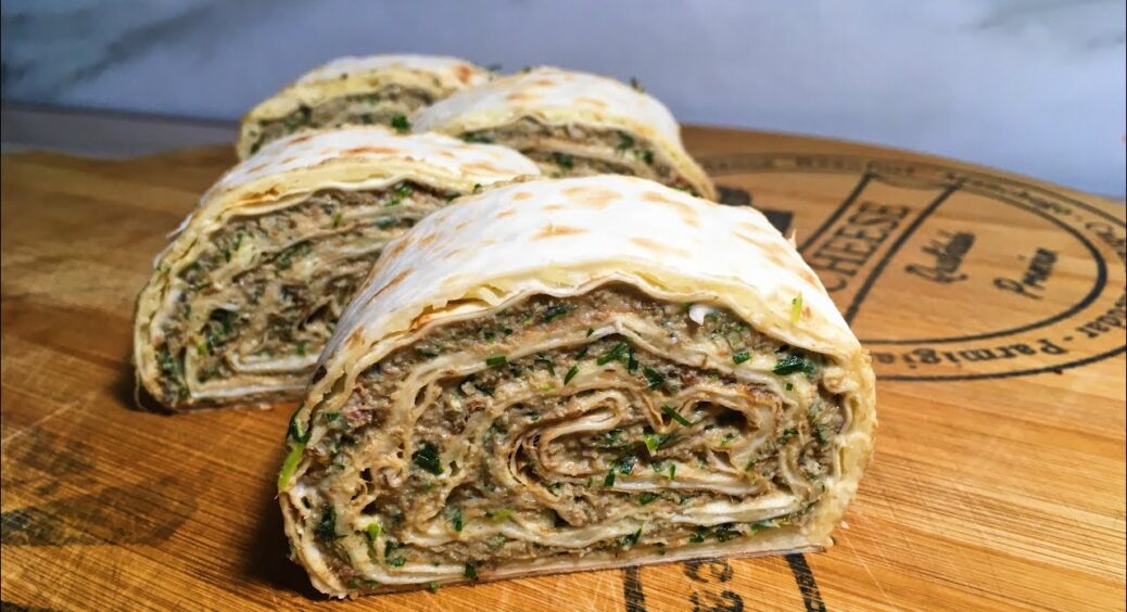 Беру лише 3 інгредієнти та лаваш – і готую святкові рулети зі шпротами: оригінальна ідея на новорічний стіл 