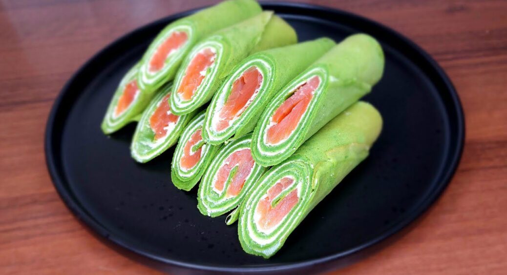 Замість “заїжджених” бутербродів з лососем на Новий рік готую зелені млинці з рибою: з’їдаються до гарячого 