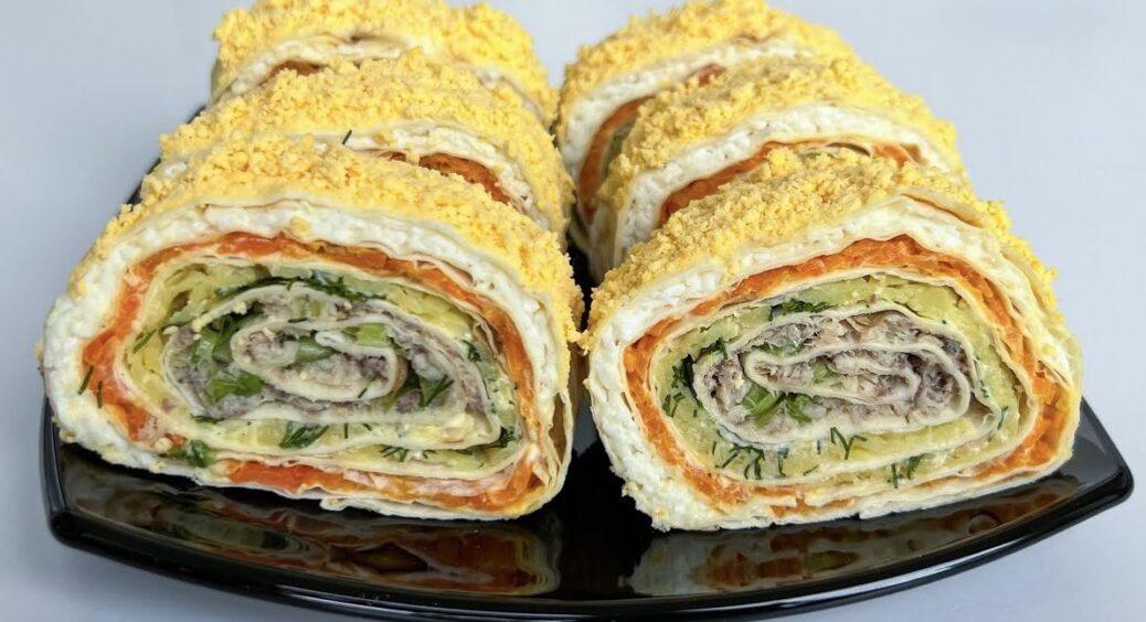 Гості “ахнули”, коли побачили цю подачу: салат “Мімоза” в лаваші — це вам не жарти, а 1 геніальний трюк 